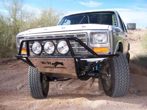 1980 Ford Bronco - This 1980 Ford Bronco features a custom off-road bumper with integrated lights and a skid plate.
