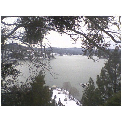 1972 Ford Ranchero - A winter scene overlooks a tranquil lake, with snow dusting the surrounding hills and trees.