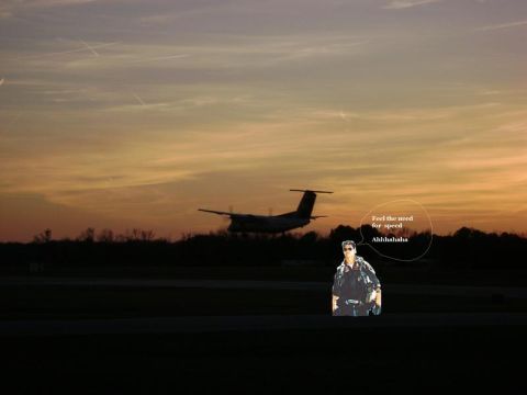 1989 Ford Bronco - An airplane is taking off during sunset, with a cutout of Tom Cruise from Top Gun in the foreground.