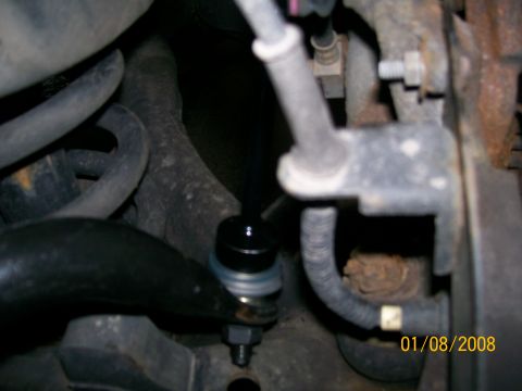 1995 Mercury Grand Marquis - A close-up view of a vehicle's front sway bar end link, dated 01/08/2008.
