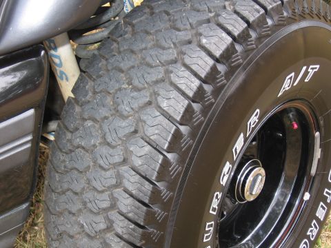 1967 Ford Mustang - A close-up view of a vehicle's off-road tire and suspension components, including a BDS shock absorber.