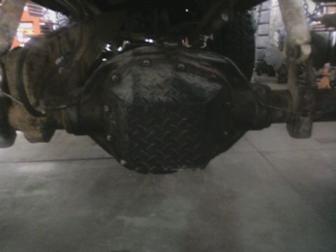1992 Ford F-350 - Close-up of a vehicle's rear differential assembly.