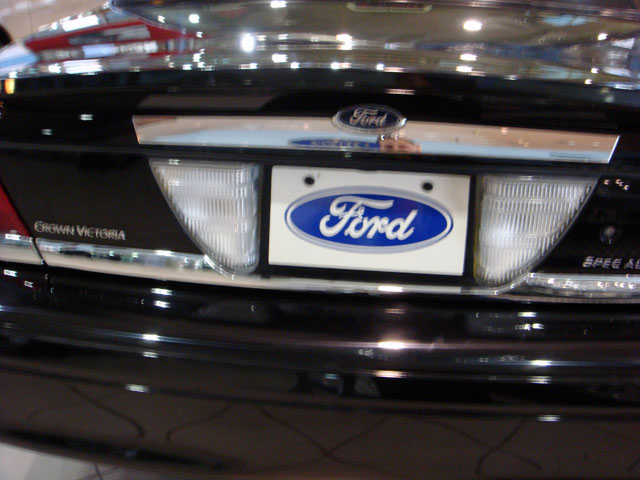 Black Ford Crown Victoria rear with Ford emblem and license plate frame