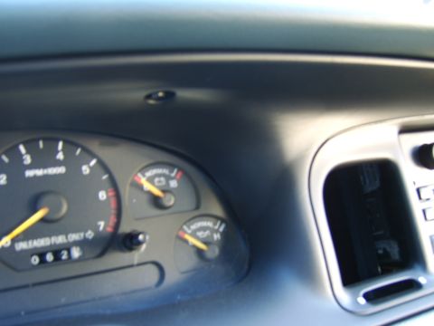 1996 Mercury Grand Marquis - The odometer reads 0628, and the fuel and oil gauges are in the normal range.