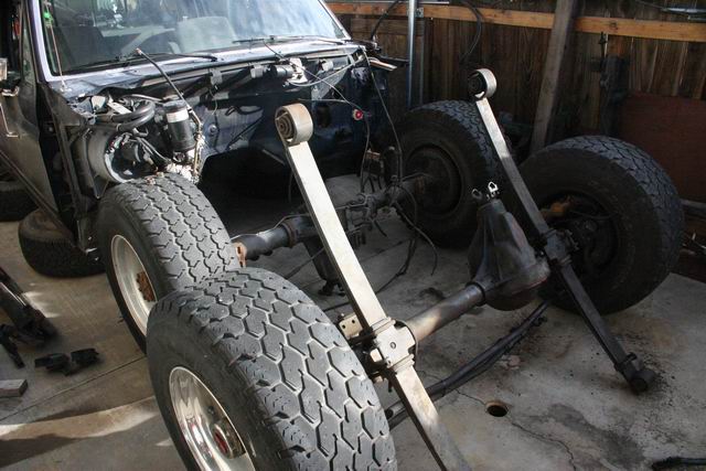 1991 Ford Bronco chassis showing front leaf spring suspension and axle