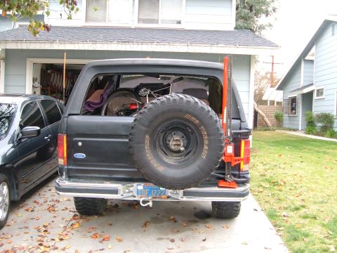 1981 Ford Bronco - Farm jack mounted with 2 ubolts, one bandana and a bike lock. Also notice the shackle on the bumper, that plate it is going through is bolt…