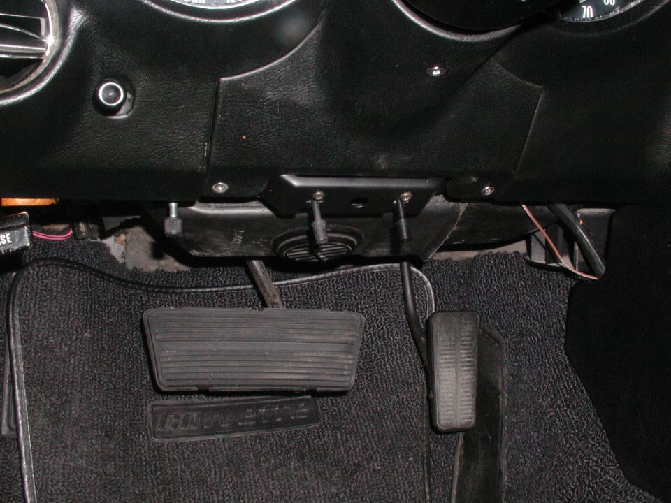 1973 Chevrolet Corvette interior footwell with pedals and floor mat