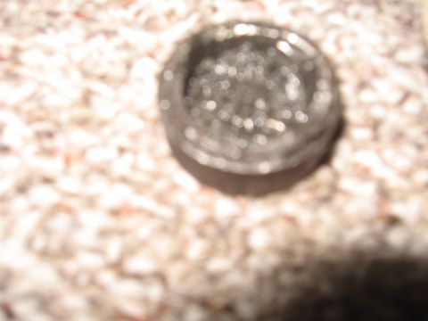 1979 Ford Bronco - Close-up of a driveshaft U-joint, with a Supermotors logo visible in the lower right corner.