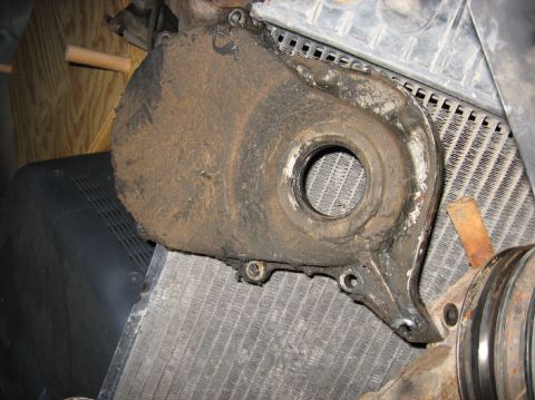 1978 Ford Bronco - Timing cover before cleaning. Thats pretty much what the oil pan and pushrod cover looked like before, also.