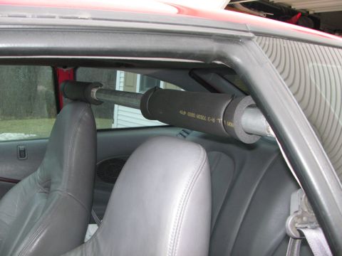 1993 Ford Probe - Interior view of a 1993 Ford Probe, highlighting the roll bar and seats.