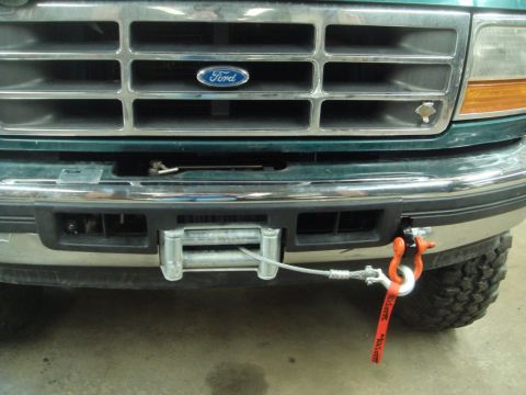 1996 Ford Bronco - Front view of a 1996 Ford Bronco showing a winch installation on the bumper.