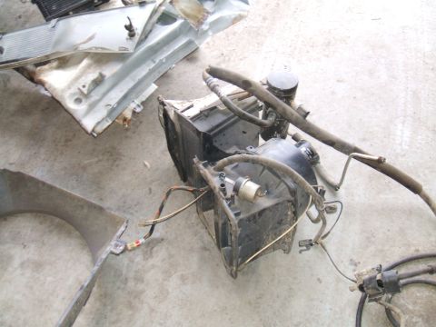 1995 Ford Bronco - Vehicle AC unit components removed for repair or replacement.