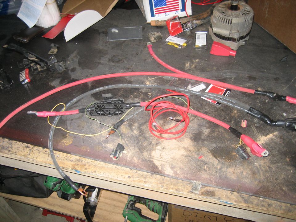 new positive from battery to starter and ignition switch, negative from battery to block and body, and alternator charging cable, all done in 2 ga. from fordfuelinjection.com