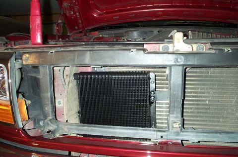 1996 Ford Bronco - Aftermarket transmission cooler installed in front of the radiator on a 1996 Ford Bronco.
