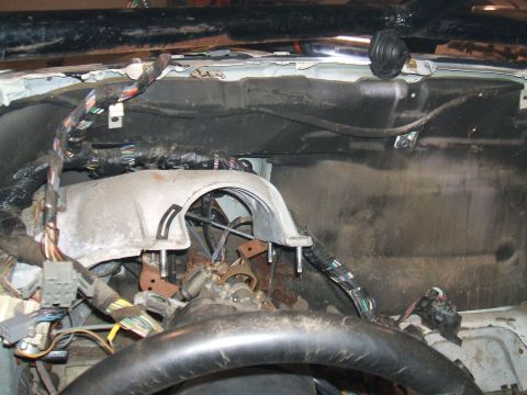 1995 Ford Bronco - The exposed dashboard and wiring of a vehicle undergoing repairs or disassembly.