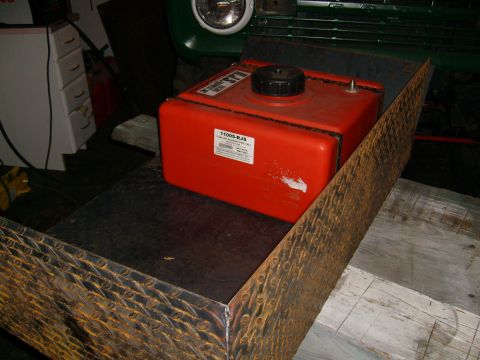 1974 Ford Bronco - An orange auxiliary fuel tank is visible inside the vehicle, with some text on its label.