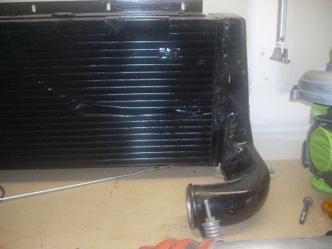 1991 Ford Mustang - Close-up of an intercooler and associated piping, with a Supermotors.net logo in the corner.