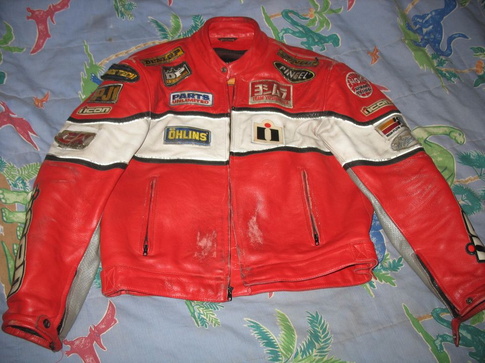 Red and white motorcycle jacket with Yoshimura and Ohlins patches