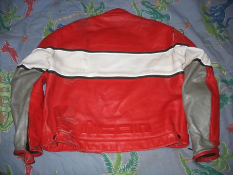 2005 Yamaha R1 - This red and white leather motorcycle jacket features an embossed 'icon' logo on the back and grey accents on the sleeves.
