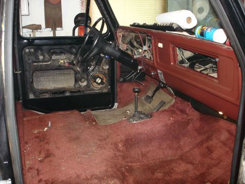 1979 Ford F-150 - Interior view of a 1979 Ford F-150 showing disassembled dashboard and door panel.