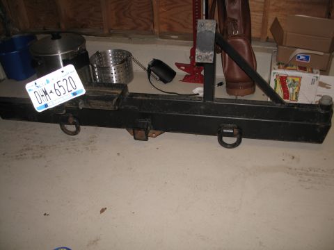 1995 Ford Bronco - A heavy-duty aftermarket rear bumper with integrated tow hitch and D-ring recovery points is shown.