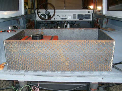 1974 Ford Bronco - Interior view of a 1974 Ford Bronco undergoing modifications, a custom cargo box.
