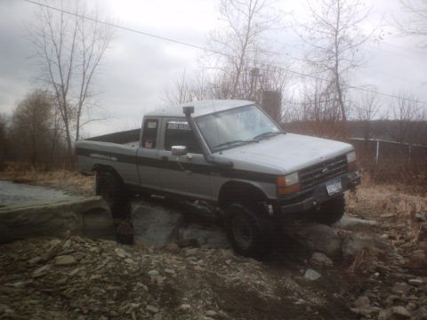 1990 Ford Ranger - This 1990 Ford Ranger is navigating a rocky terrain, its off-road capabilities.