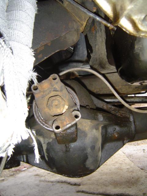 1979 Ford Bronco - Close-up view of the driveshaft and differential assembly, showing mechanical components.