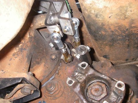 1978 Ford Bronco - This image shows the linkage mechanism for a transfer case, not the exterior of a vehicle.