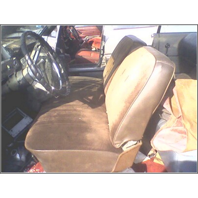 1972 Ford Ranchero - Interior view of a car, showing brown seats, dashboard, and steering wheel.