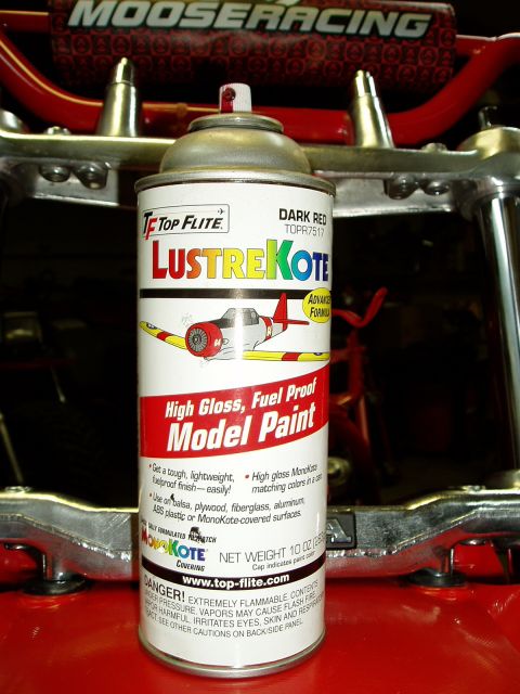 2000 Ford E350 - A can of Top Flite LustreKote Dark Red model paint is shown against a red background with metallic handlebars.