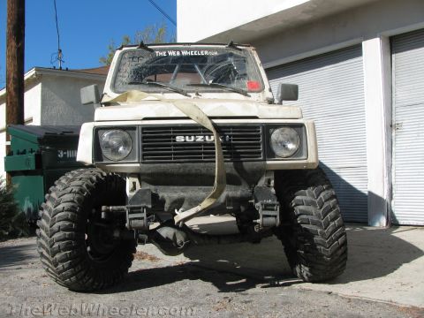 1987 Suzuki Samurai - This Suzuki Samurai has been modified for off-road use with oversized tires and a lifted suspension.