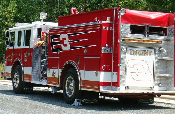 Fire engine with number 3 on the side and back. M.F.D. is written on the side