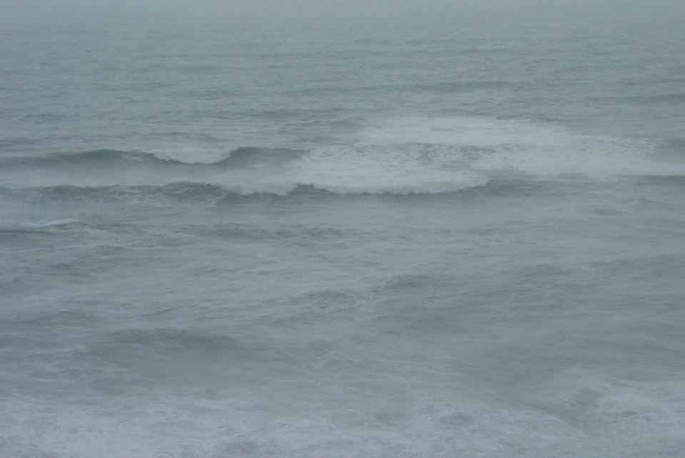 Ocean waves with Supermotors logo