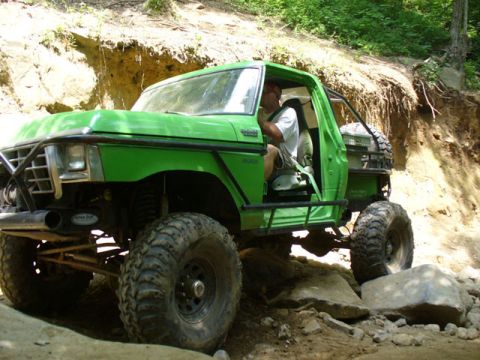1978 Ford Bronco - This modified 1978 Ford Bronco navigates a challenging rocky terrain, its off-road capabilities.