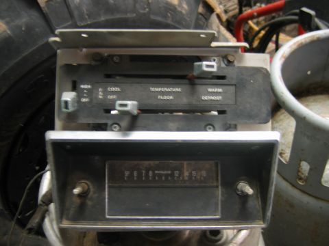 1992 Ford Mustang - Climate control panel and Philco radio from a vehicle, likely for parts or restoration.