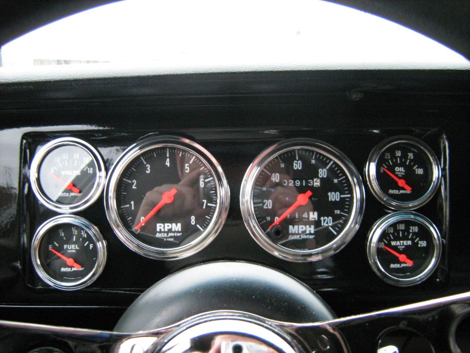 Custom Auto Meter gauge cluster with tach and speedometer