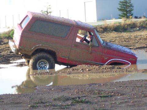 1986 Ford Bronco - This 1986 Ford Bronco is stuck deep in a mud pit.