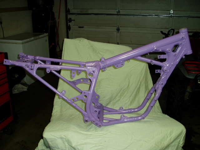 Purple painted motorcycle frame on a stand