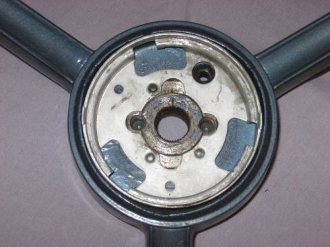 1972 Ford F-100 - Close-up view of a steering wheel hub, likely from an older vehicle. The registry claims it is from a 1972 Ford F-100, but this is unconfir…