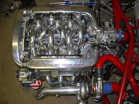 1993 Ford Taurus - Customized Ford SHO engine with twin turbochargers and polished intake components.