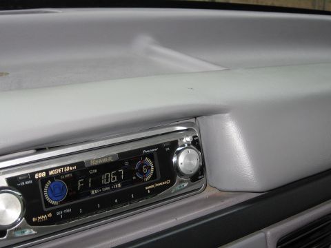 1967 Ford Mustang - Interior view of a car dashboard, focusing on an aftermarket Pioneer Premier stereo system.