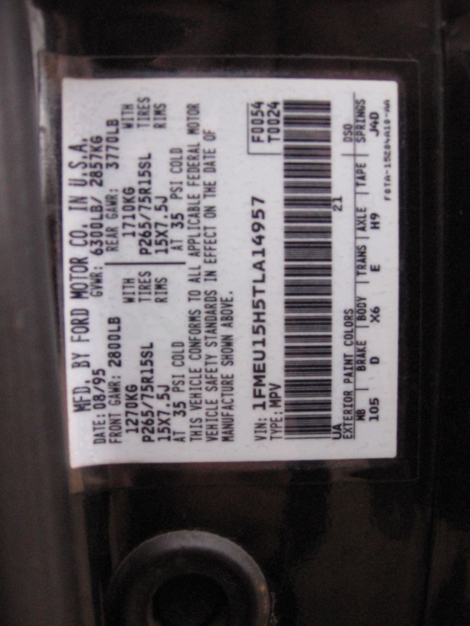 Ford Motor Co. MPV certification label dated 08/95 with VIN 1FMEU15H5TLA14957, GVWR and tire data