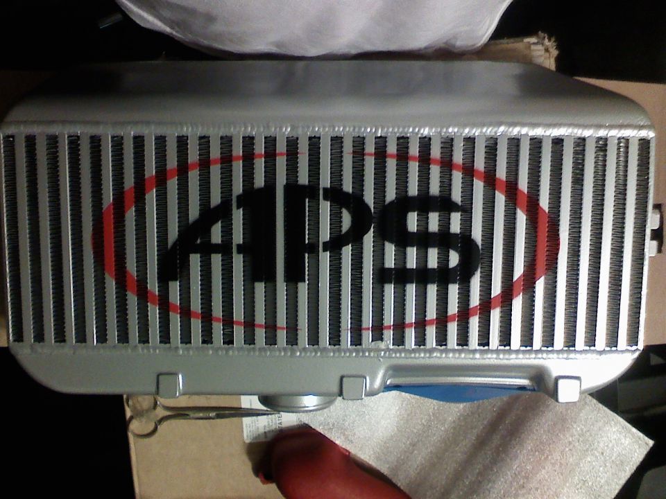 Front-mount intercooler with APS logo on the core