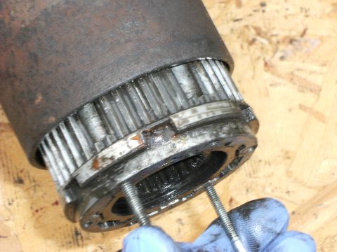 1992 Ford F-150 - Thread two of the screws back into the hub internal and pull it out.