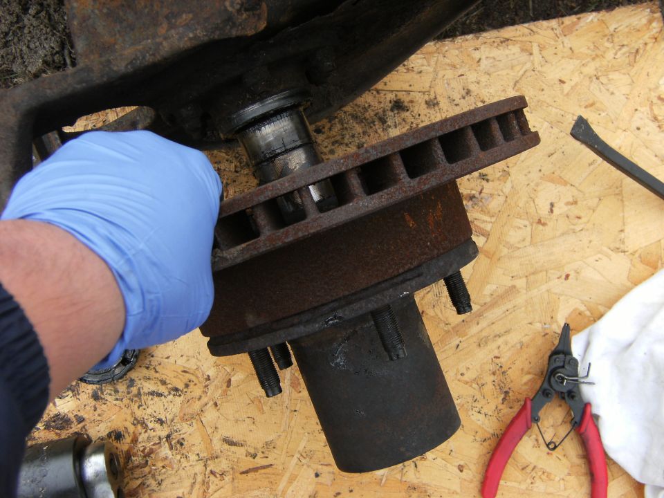Remove the hub and rotor assembly