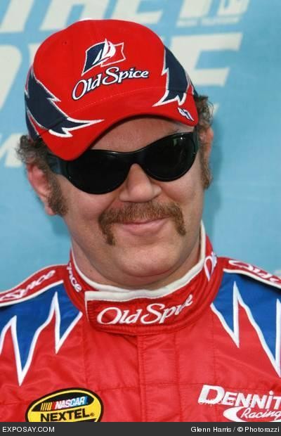1996 Ford Bronco - A man sports an Old Spice racing outfit, complete with a branded cap, sunglasses, and a distinctive mustache.
