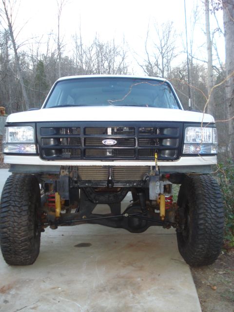 1996 Ford Bronco - This lifted Ford Bronco shows its front grille and suspension modifications.