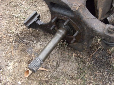 1992 Ford F-150 - Then tap the spindle with a mallet and it will come off, leaving you with the shaft in the knuckle.