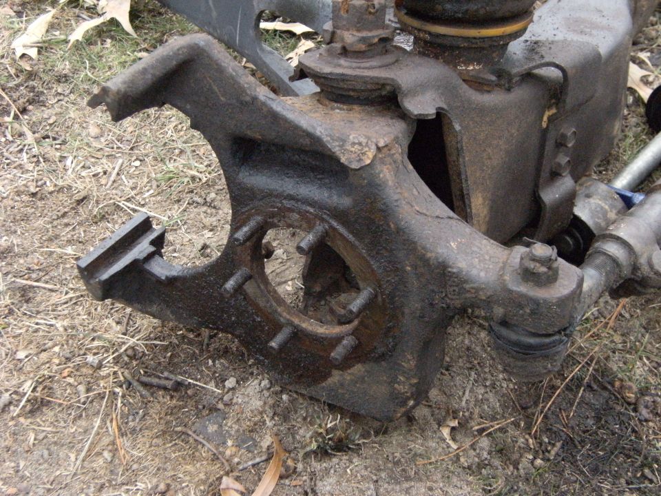 Then the axle shaft will pull out and you will be left with the empty knuckle.